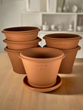 Ben Wolff #4 Tuscan Rim Half Pot in Red Terracotta. Sealed #6 saucer with cork pads. 5.5”H x 7.75”W --- MULTIPLE AVAILABLE