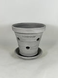 ZSPC1154-27 Ben Wolff #1 Orchid Full Pot in Grey Finish. Sealed saucer with felt pads. 4”H x 4.5”W --- ONE OF A KIND